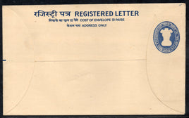 Vintage registered letter envelope with blue text and stamp
