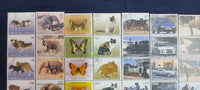 Worldwide 65 Diff. Stamp on Cat Dog Elephant Car Trains Butterflies Horse Cancelled # 7089