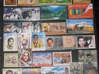 India 2009 Year Pack of 107 Stamps Horses Whale Gandhi Textile Polar Antarctica Hindu Mythology MNH